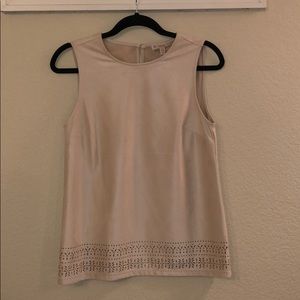 Off white tank top with cute eyelit design.